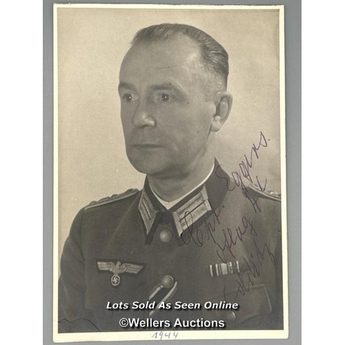 73 - A signed photograph of Hauptmann Reinhold Eggers who was Colditz Security Officer between 1940-1945,... 