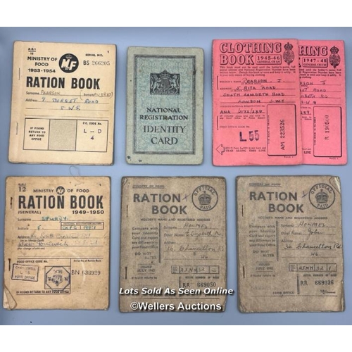 124 - A selection of original WW2 British Ministry of Food ration books, clothing books and a National Reg... 