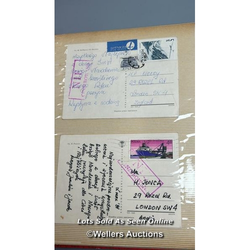 136 - A photo album containing original Polish stamps on letters and postcards  from the 1970s and 1980s.