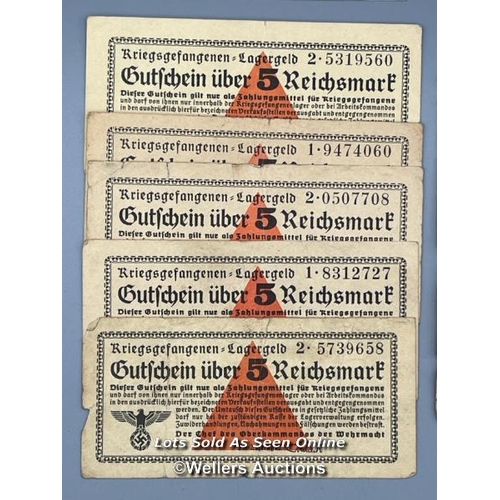 146 - A collection of German currency used in Prisoner of War camps including 
5 and 50 Pfennig banknotes ... 