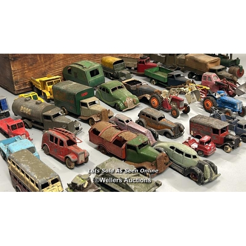 1 - Assorted diecast model vehicles including trucks, tractors, cars and tanks, all in very well used co... 