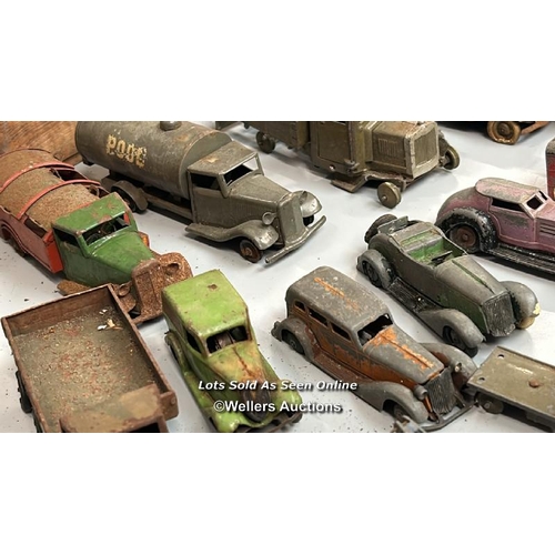 1 - Assorted diecast model vehicles including trucks, tractors, cars and tanks, all in very well used co... 