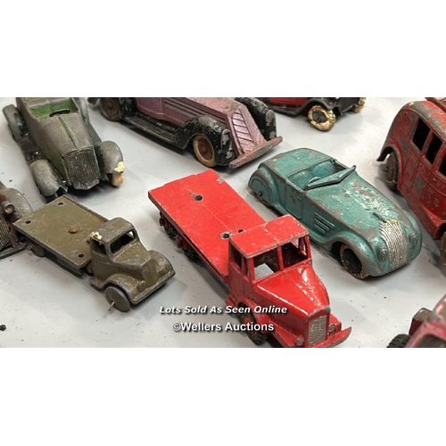 1 - Assorted diecast model vehicles including trucks, tractors, cars and tanks, all in very well used co... 