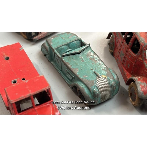 1 - Assorted diecast model vehicles including trucks, tractors, cars and tanks, all in very well used co... 