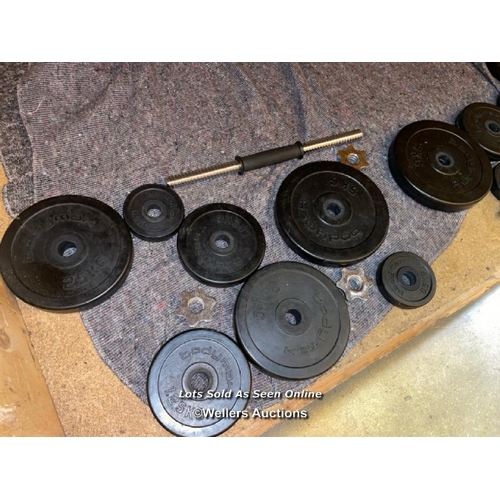 46 - Assorted gym weight plates and bars for dumbells / Container No: XX02325