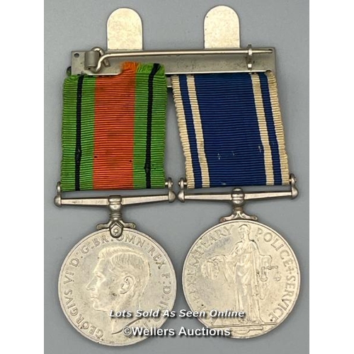 203 - Two genuine mounted medals to Charles H. J. Booker, one is the UK Police Exemplary Service Medal 20 ... 