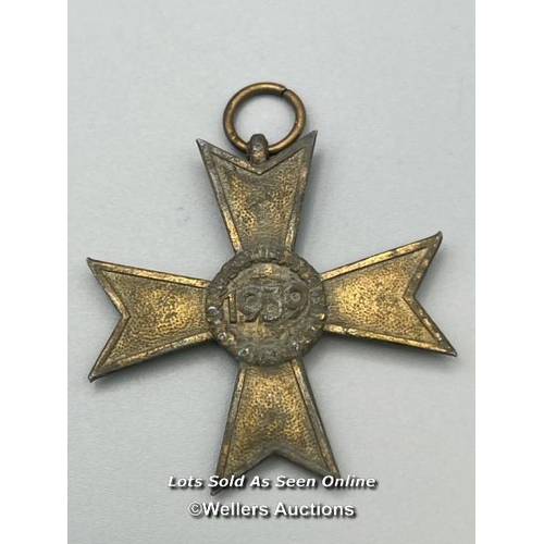 205 - A genuine German War Merit Cross 2nd Class from WW2 dated 1939.

This medal is in a used condition a... 