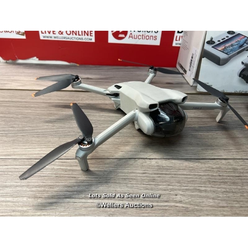 8201 - DJI MINI 3 DRONE WITH DJI REMOTE CONTROL / POWERS UP / SIGNS OF USE / NOT FULLY TESTED / MISSING SD ... 