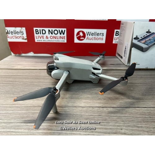 8201 - DJI MINI 3 DRONE WITH DJI REMOTE CONTROL / POWERS UP / SIGNS OF USE / NOT FULLY TESTED / MISSING SD ... 