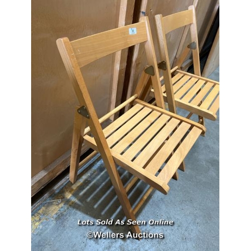 33 - Two modern folding chairs / Container no. BM000130