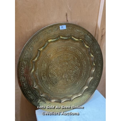 45 - Brass charger, 58cm (dia) / Container no. BM000130