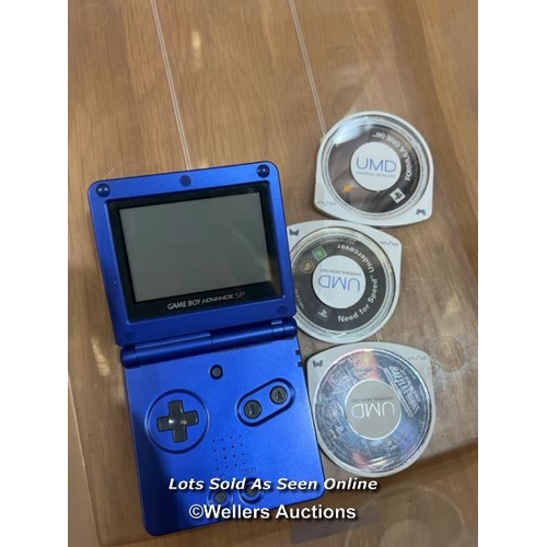 59 - Nintendo Gameboy advance SP and x3 PSP umds / Container no. BM000847