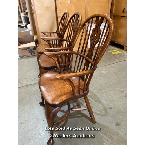 86 - Three wheel and slat back Windsor chairs, 103cm (h) x 53cm (w) x 45cm (d) / Container no.  BM000508