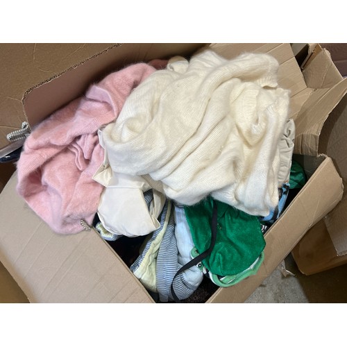 82 - Two boxes, one full of clothes, the other full of linen / Container no.  BM000508