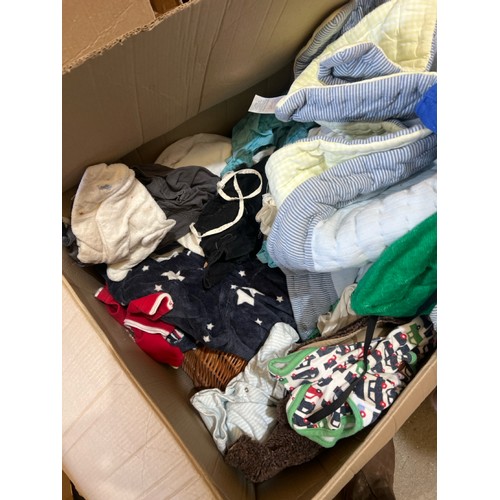 82 - Two boxes, one full of clothes, the other full of linen / Container no.  BM000508