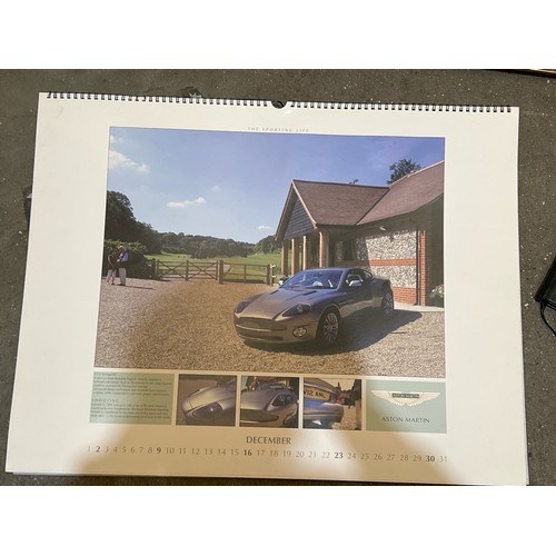 96 - Aston Martin collection, framed poster, calendar, journal and owners club planner 2003 / Container n... 