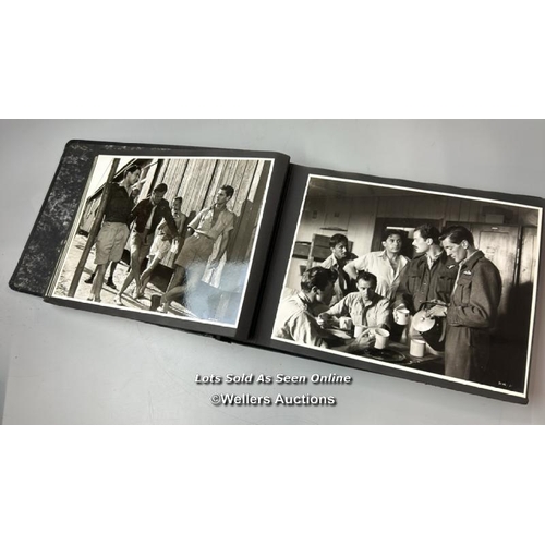 290 - An album containing approximately 125 original black and white production photographs, portraits, an... 