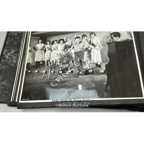 290 - An album containing approximately 125 original black and white production photographs, portraits, an... 