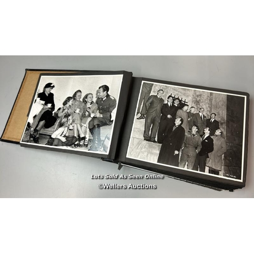 292 - An album containing approximately 124 original black and white production photographs, portraits, an... 