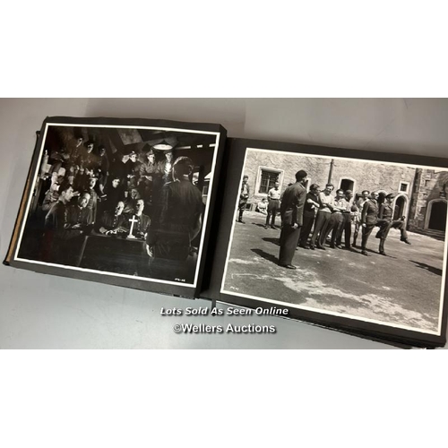 292 - An album containing approximately 124 original black and white production photographs, portraits, an... 