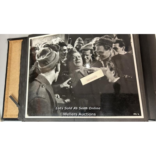 292 - An album containing approximately 124 original black and white production photographs, portraits, an... 