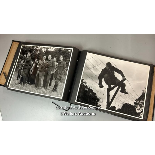 292 - An album containing approximately 124 original black and white production photographs, portraits, an... 