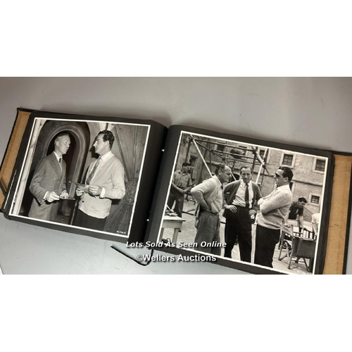 292 - An album containing approximately 124 original black and white production photographs, portraits, an... 