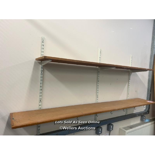 2015 - Wall shelf components, comprising of two wooden shelves and associated metal fixtures, longest shelf... 