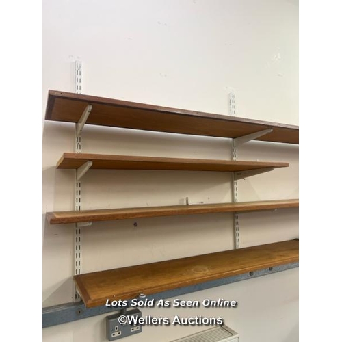 2017 - Wall shelf components, comprising of eight wooden shelves and associated metal fixtures, longest she... 