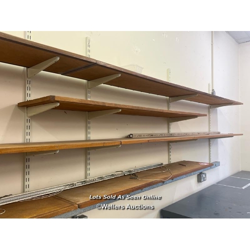 2017 - Wall shelf components, comprising of eight wooden shelves and associated metal fixtures, longest she... 