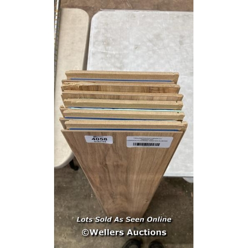 4058 - LAMINATE FLOORING TOASTED ALMOND         / SOME DAMAGED EDGES / SEE IMAGES / W3