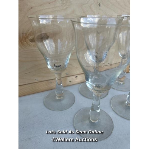 16 - Five large glass chalices, four of the rims slightly chipped, 23cm h - NO VAT ON HAMMER / Container ... 