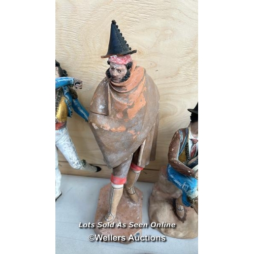 20 - Five clay figurines of performers, tallest 35cm h, some damage present - NO VAT ON HAMMER / Containe... 