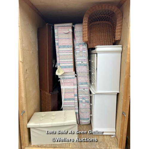 30 - A container of assorted reproduction furniture including display cabinets, bed bases, wicker chair, ... 