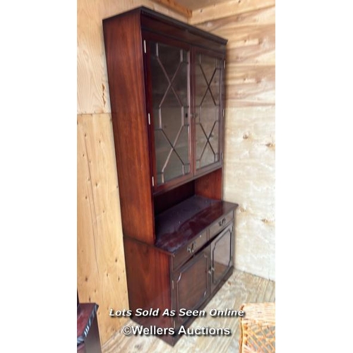 30 - A container of assorted reproduction furniture including display cabinets, bed bases, wicker chair, ... 