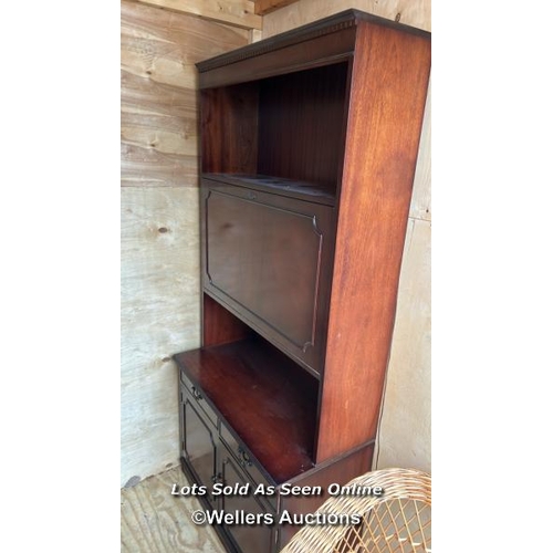 30 - A container of assorted reproduction furniture including display cabinets, bed bases, wicker chair, ... 