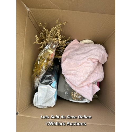 31 - A container of assorted linen, cushions, lamp shades, clothing and miscellaneous household items, si... 