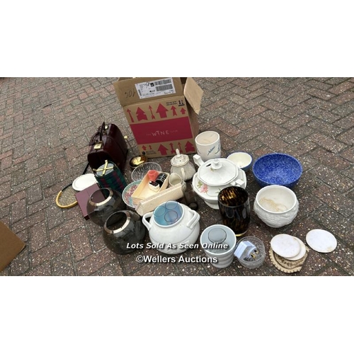 31 - A container of assorted linen, cushions, lamp shades, clothing and miscellaneous household items, si... 