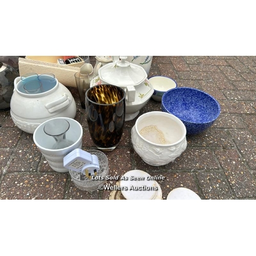 31 - A container of assorted linen, cushions, lamp shades, clothing and miscellaneous household items, si... 