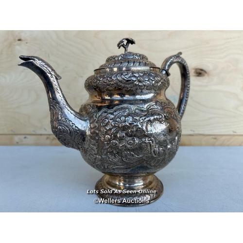 4 - A silver plated tea pot with ornate and decorative floral patterning, weighs 875g - NO VAT ON HAMMER... 