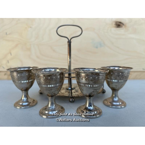 5 - A hallmarked sterling silver egg cup holder with four silver plated egg cups, 16cm h, weighs 330g - ... 