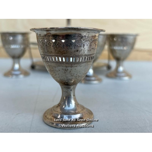 5 - A hallmarked sterling silver egg cup holder with four silver plated egg cups, 16cm h, weighs 330g - ... 