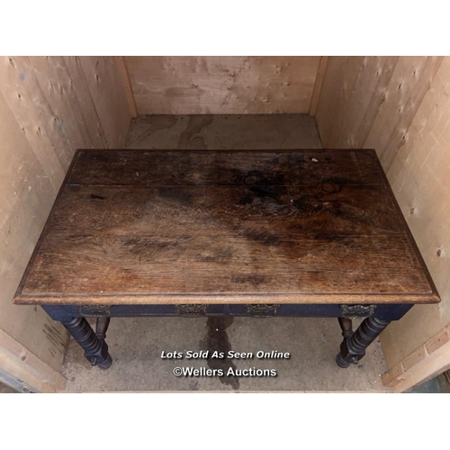 53 - Victorian oak two draw desk on turned legs and refectory style base with original handles, rear righ... 