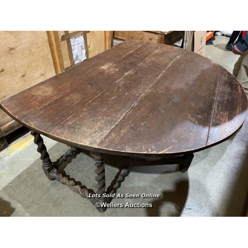 55 - Oval oak dining table consisting of 17th century solid oak top on 18th century barley twist legs, fo... 