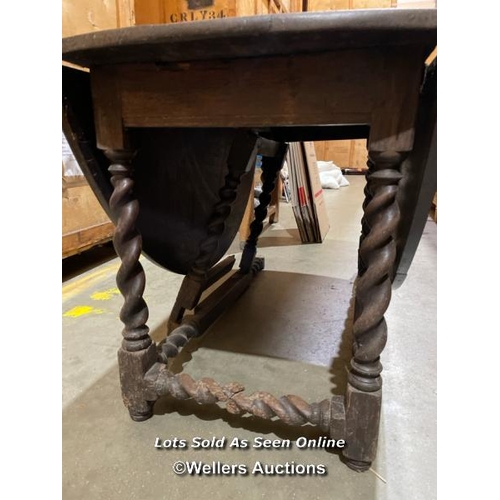 55 - Oval oak dining table consisting of 17th century solid oak top on 18th century barley twist legs, fo... 