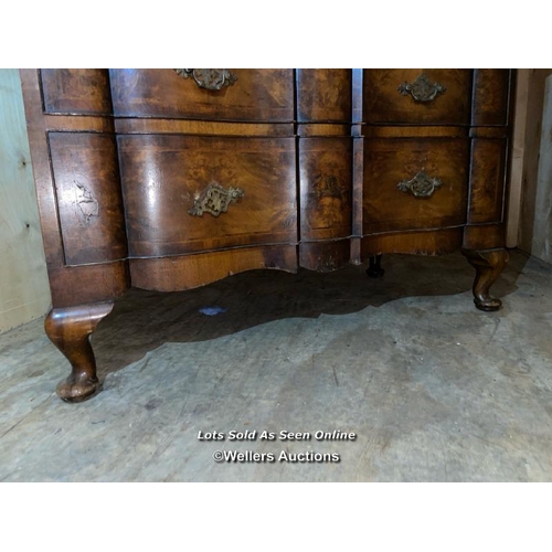 57 - A late 19th or early 20th century Bartholemew and Fletcher walnut veneered dressing table, with serp... 