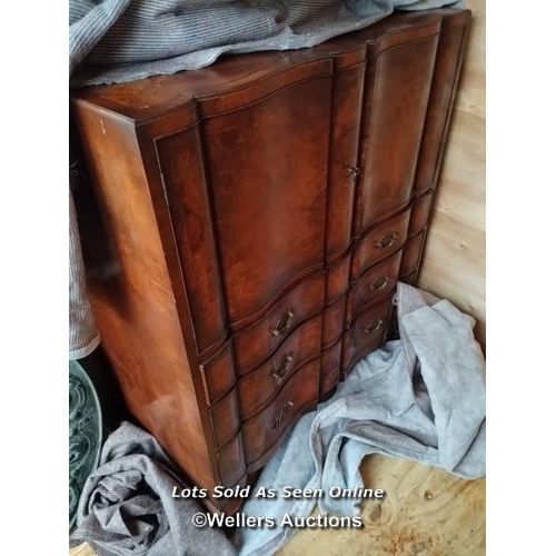 57 - A late 19th or early 20th century Bartholemew and Fletcher walnut veneered dressing table, with serp... 