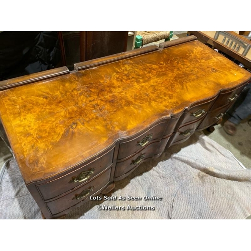 57 - A late 19th or early 20th century Bartholemew and Fletcher walnut veneered dressing table, with serp... 