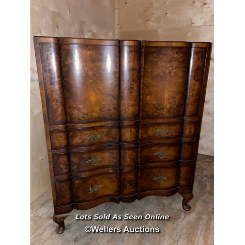 57 - A late 19th or early 20th century Bartholemew and Fletcher walnut veneered dressing table, with serp... 