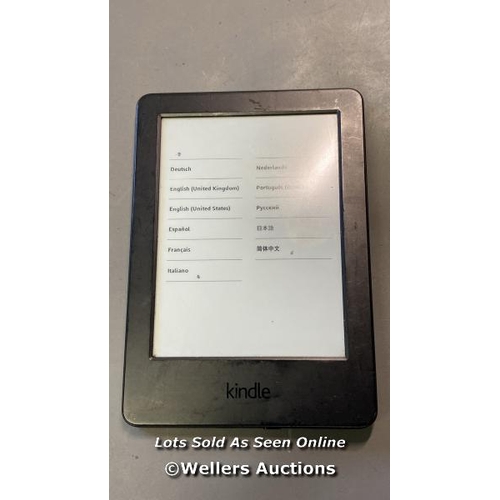 9563 - PRE OWNED AMAZON KINDLE